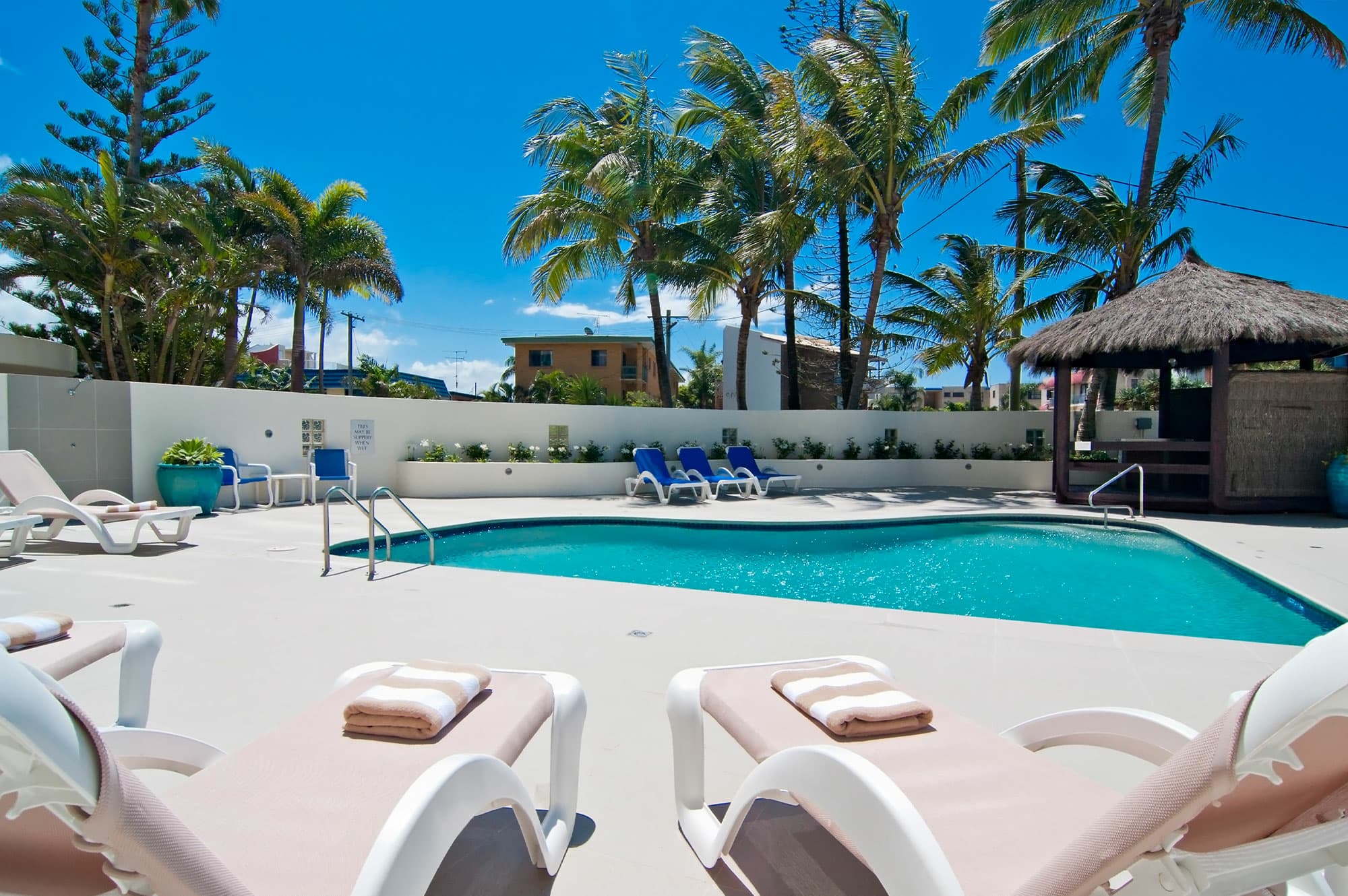 Daybeds by resort pool